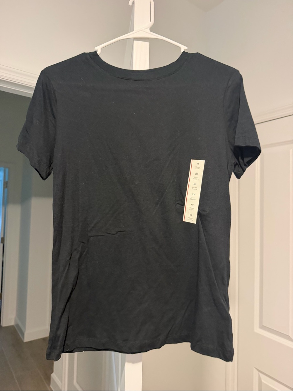a new day Black Short Sleeve Crewneck Tee